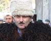 Участники конференции Абдулсаламов Асхабали научный сотрудник ЯЛИ ДНЦ примеряет национальную одежду тиндинцев.